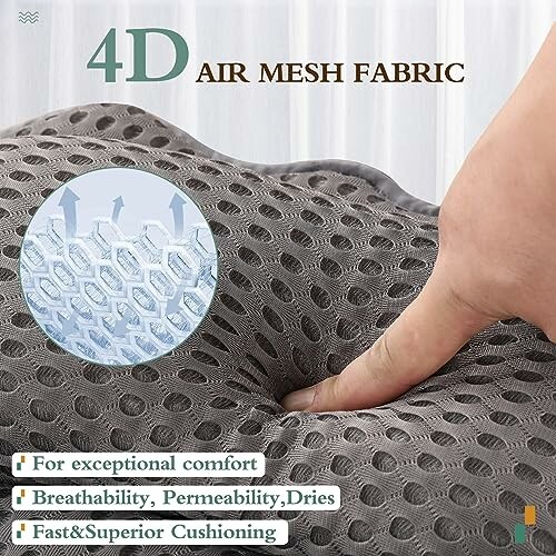 Hand pressing gray 4D air mesh fabric showcasing breathability and cushioning.