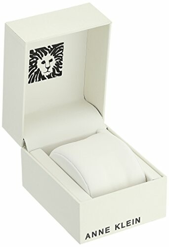 Anne Klein watch box with lion logo.