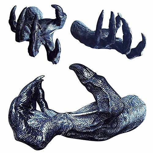 Three black clawed monster hands for Halloween decoration.
