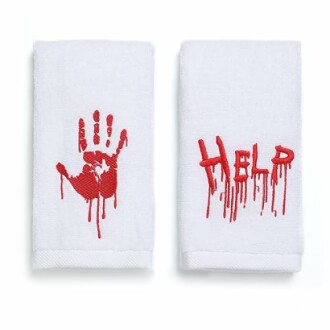 White towels with red bloody handprint and the word 'Help'.