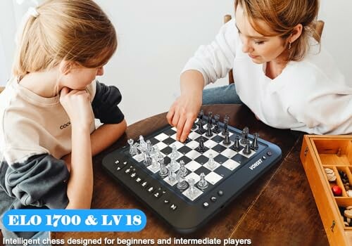 Woman and child playing electronic chess game