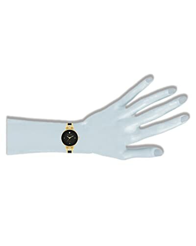 Gold wristwatch on mannequin hand