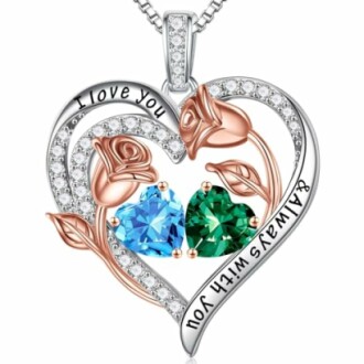 Heart-shaped pendant necklace with two heart-shaped gems and rose accents.