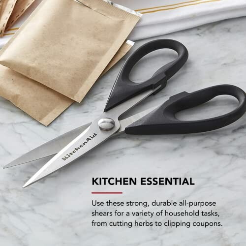 KitchenAid scissors on marble surface with paper bags