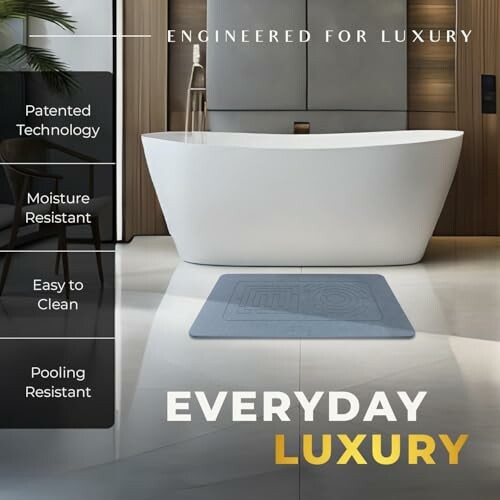 Luxury bathroom with freestanding tub and mat featuring patented technology.