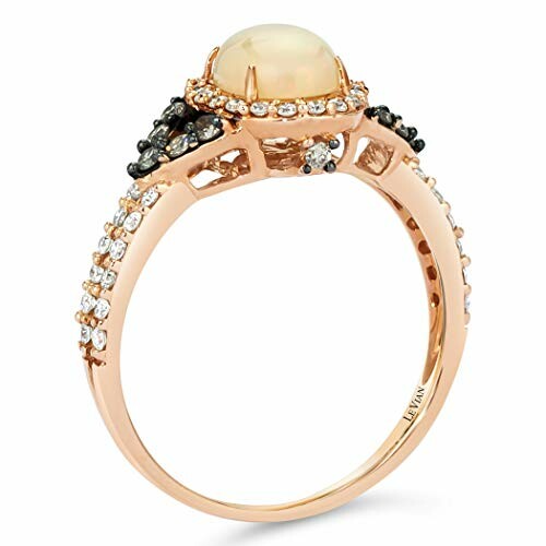 Side view of opal and diamond rose gold ring with intricate design.