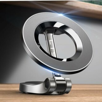 Sleek metal phone ring holder on a wooden surface