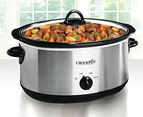 Slow cooker with beef stew and vegetables