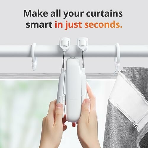 Hands installing a smart curtain device on a rod.