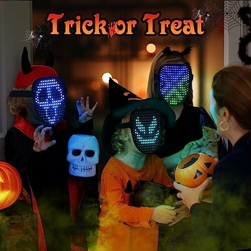 Children in Halloween costumes with LED masks and pumpkin buckets, Trick or Treat sign.
